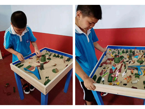 长沙特训学校孩子进行沙盘游戏治疗辅导
